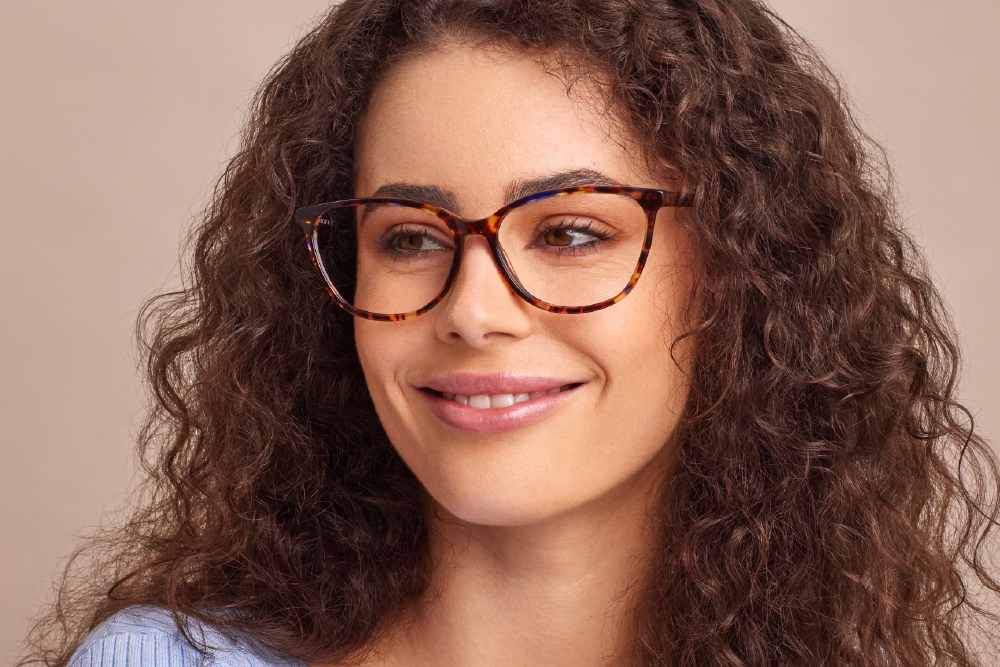 Faye Acetate eyeglasses frame worn by model.