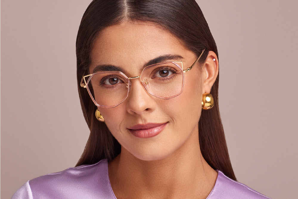 Kitty TR/Ultem Material eyeglasses frame worn by model.